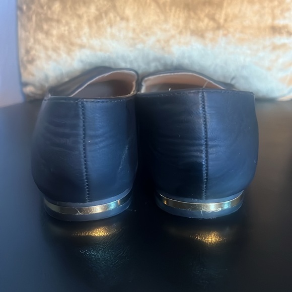 Preowned Express black loafers with gold accent on heels. Size 10. - Picture 4 of 5